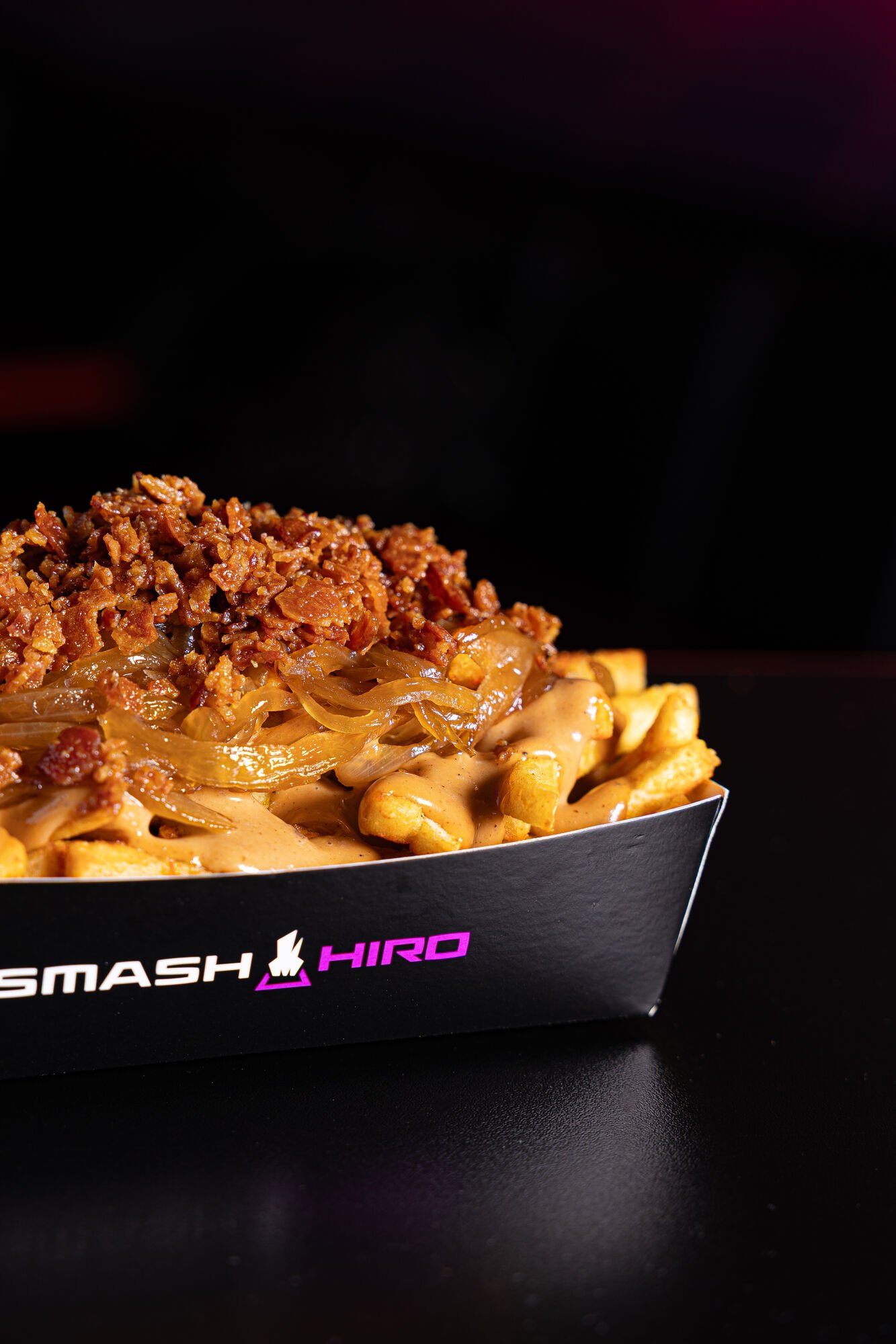Detalle de hamburguesa con salsa estilo Smash Hiro